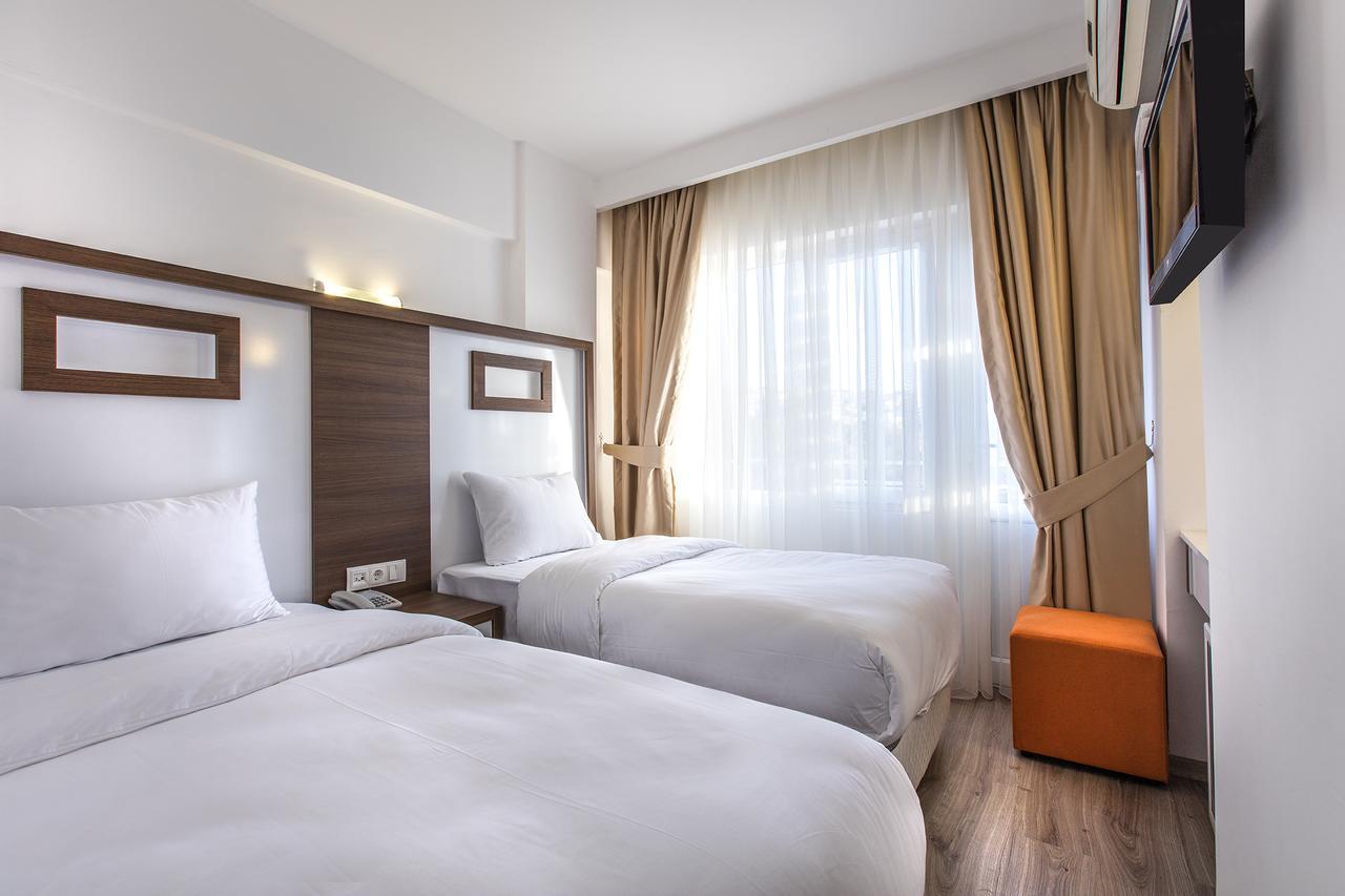 Demir Suit Hotel คูซาดาซี ภายนอก รูปภาพ