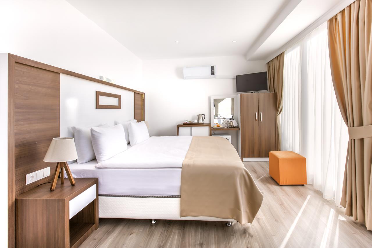 Demir Suit Hotel คูซาดาซี ภายนอก รูปภาพ